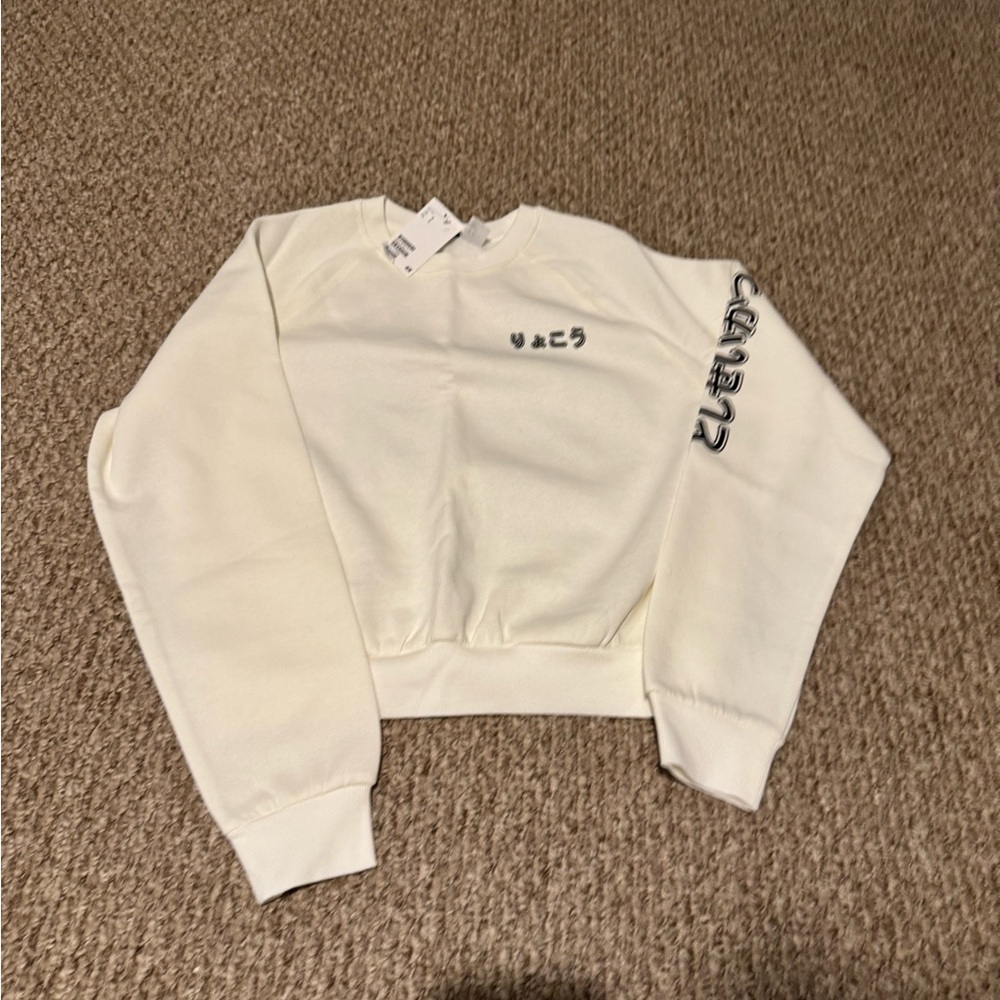 DIVIDED Women's Graphic Cream Sweater NWT